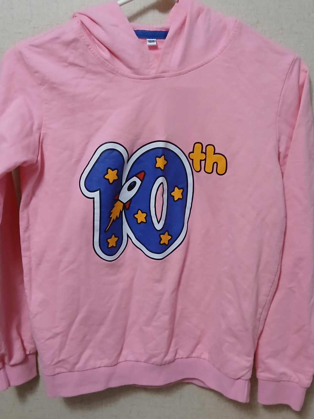 Source Unknown Pink Hoodie with Blue Rocket '10' Graphic
